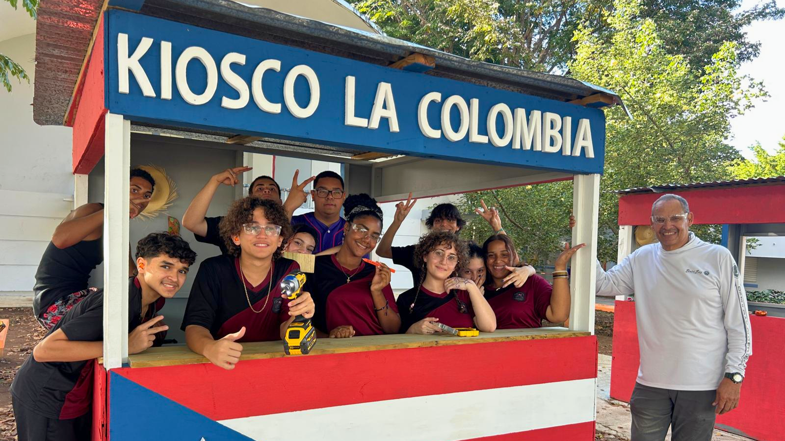 Students from PRoTechos’ Youth Carpentry Program at Escuela República de Colombia with a completed carpentry project.